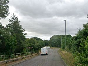 Supporting image for story: Car ends up on roof after crash in Shrewsbury - police and firefighters on scene