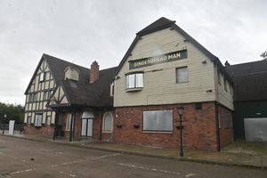 The pub has been boarded up