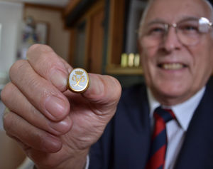 Ross with his cherished Gold award badge.
