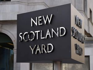 New Scotland Yard sign