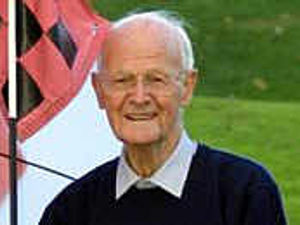 Supporting image for story: Charles tees off for his 100th