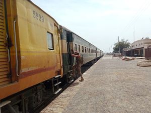 A paramilitary soldier takes position at a railway station near the attack site of a passenger train by insurgents, in Mushkaf