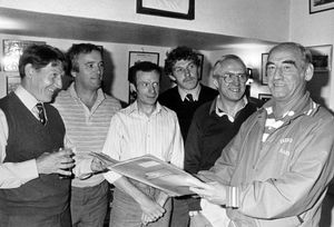 A picture of Bridgnorth Rugby Club taken on July 29, 1986. The caption reads: 'It's Bridgnorth Rugby Club's 25th anniversary this season - and they have already started celebrating. Players and officials met at the clubhouse last night to meet the club's first skipper, founder member Phil Bladen, who is now living in America and is over in this country on holiday. From left: Roy Colburn, Jeff Peake, Bob Fletcher, Colin Bevan, Bob Turner, and Phil Bladen.'