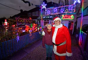 Nick and Julia Barnard with their festive light display