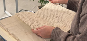 A collection of documents on display at the exhibition, which includes a letter to Stone from a Jamaican plantation.