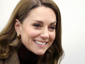 Supporting image for story: ‘Can you hear the sea?’ Kate shows shell trick to girl at family trauma centre