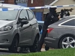 Supporting image for story: Large numbers of armed police seen in Wolverhampton street - road cordoned off