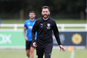 Carlos Corberan hands out orders during the session (Photo by Adam Fradgley/West Bromwich Albion FC via Getty Images).