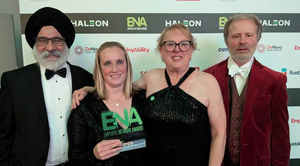 Sukhvinder Singh, Dr Melanie Best, Megan Lawton and Julian Gwinnett collect the award