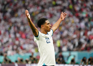 England's Jude Bellingham celebrates scoring their side's first goal of the game during the FIFA World Cup Group B match at the Khalifa International Stadium, Doha. Picture date: Monday November 21, 2022. PA Photo. See PA story WORLDCUP England. Photo credit should read: Mike Egerton/PA Wire...RESTRICTIONS: Use subject to restrictions. Editorial use only, no commercial use without prior consent from rights holder..