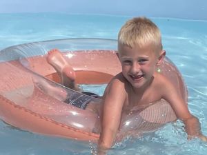 Freddie Farrow in a swimming pool