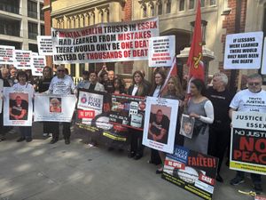 Protesters outside Arundel House in London, where the Lampard Inquiry is taking place