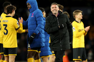 Rob Edwards celebrates with his players at full time (Photo by Brett Patzke - WWFC/Wolves via Getty Images)