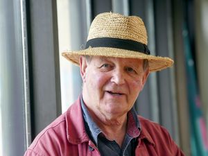 Sir Michael Morpurgo wearing a straw hat