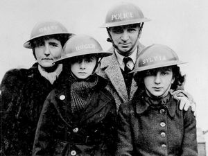 Supporting image for story: Dramatic home front photos show life of a family at war