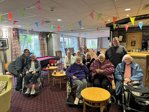 Residents and colleagues from HC-One’s Foley Grange Care Home enjoying Elvis Presley tribute performance