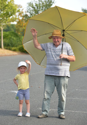 Peter Morris, from Shrewsbury, and granddaughter Autumn Bevan watching the relay
