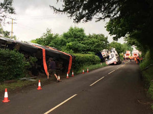 Supporting image for story: Watch: Crane tips over into hedge trying to lift out ANOTHER crane on Shropshire border