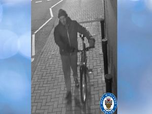 Supporting image for story: Man being searched in connection with burglary at Black Country hairdressers