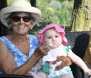 Sandie Hughes with nine-month-old Dottie Jakeman from Market Drayton enjoying an ice cream in The Quarry, Shrewsbury. Photo: Phil Blagg Photography. 