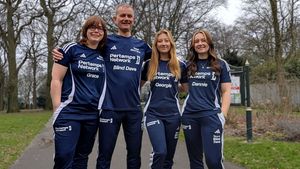 'Blind Dave' Heeley with his three daughters - All will be running the London Marathon today.