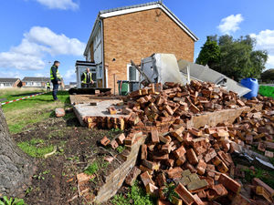 Supporting image for story: Woman suffers 'serious head injuries' and two arrested after car hits brick wall in West Bromwich