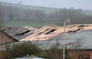SJ Roberts near Welshpool where a fire had spread to an industrial building