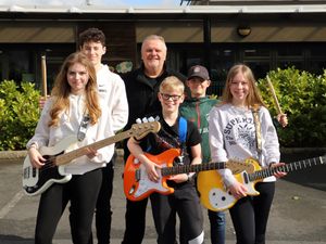 Supporting image for story: Bridgnorth business hits right notes for music charity 