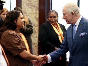 Supporting image for story: Aboriginal Australians perform for King at 40th anniversary of Uluru Handback