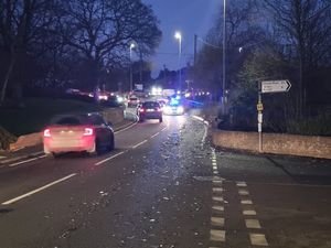 Supporting image for story: Investigation under way after lorry spills 20 tonnes of glass and plastic along road