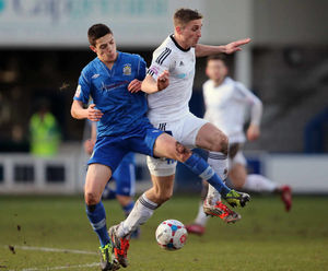 Scott Duxbury of Stockport County and Mike Phenix of AFC Telford United