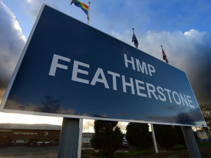 Supporting image for story: Travellers park up on HMP Featherstone