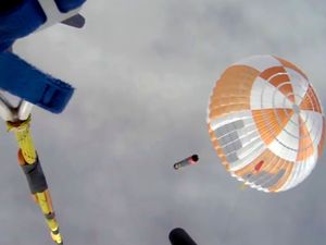 Supporting image for story: Helicopter catches – and then drops – falling Electron rocket