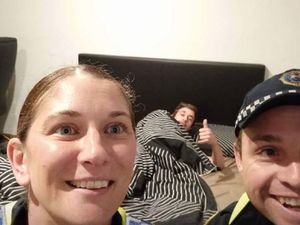 Supporting image for story: These police officers took the best selfie with a drunk man who they helped get home safely 