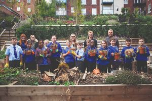 Pupils from St Mary’s Catholic Primary School make bug hotels at Brookfields House, a retirement community in Newcastle-under-Lyme