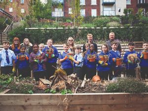 Supporting image for story: Schoolchildren and retired homeowners come together to celebrate gardening and nature