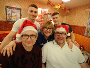 Walsall players Caolan Lavery, and Alfie Bates with clinical nurse manager Tracey Grinell, and patients Matthew Alcock and Nigel Rose