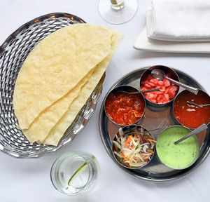The poppadoms and selection of dips