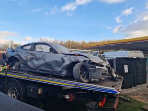 Supporting image for story: Watch as BMW car that smashed into Telford house is removed four days on