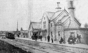 A poor quality photo showing Much Wenlock station in 1868. Among the figures on the platform are Mr Joseph Waller, Mr Ruscoe (first stationmaster), Mr John Yapp (signalman) and Mr Brookfield (booking clerk).