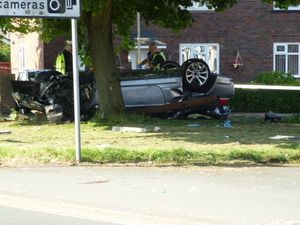 The car ended up on its roof. Credit: Gavin Allan