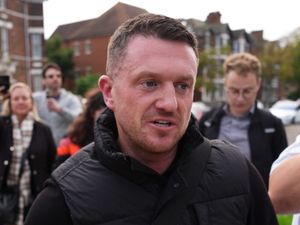 Tommy Robinson outside Folkestone police station in October 2024