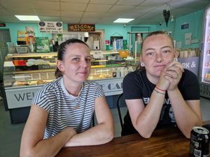 Tribute to father:  (L) Rebecca and (R) Danni, daughters of Craig Bloomer