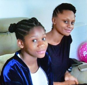 Errol Richards 54 (Works at RICOH in Telford, hence Shropshire Star too), he and work colleagues are fundraising for his daughter Anntoinette Richards to have experimental treatment to fight cancer. He holds a pic of her and of them together..