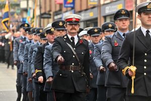 A procession through Shrewsbury including units of HM forces