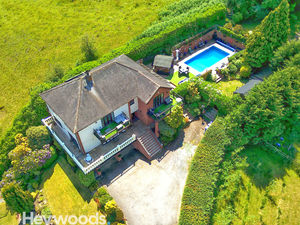 Supporting image for story: £850k is enough to take a dip on this 'luxurious' seven-bedroom home – with a pool