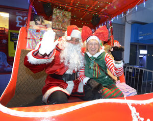 Raising money for Rotary Club of Halesowen & Rowley Regis, Jack Hadlington and Pam Arrowsmith, during the switching on of Halesowen Christmas lights..