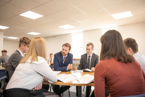 Ben Brennan with sixth formers at The Hart School 