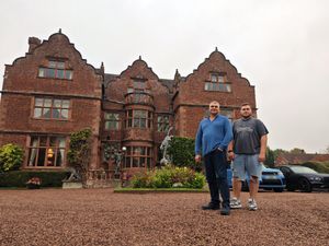 Steve and Joe Smith outside Ludstone Hall - an historic moated manor house that has been the family home of the Poundland founder for many years