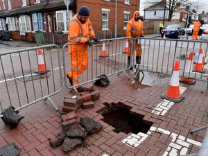 Supporting image for story: Pictured: Nne alarming photos of a Wolverhampton sinkhole as residents talk of shock at sudden appearance of a hole in a road